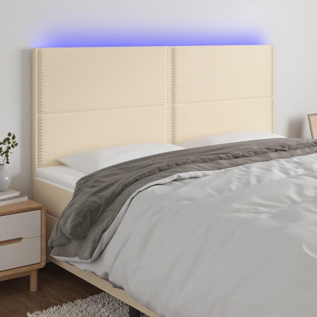 Sengegavl med LED-lys 180x5x118/128 cm - stof, cremefarvet
